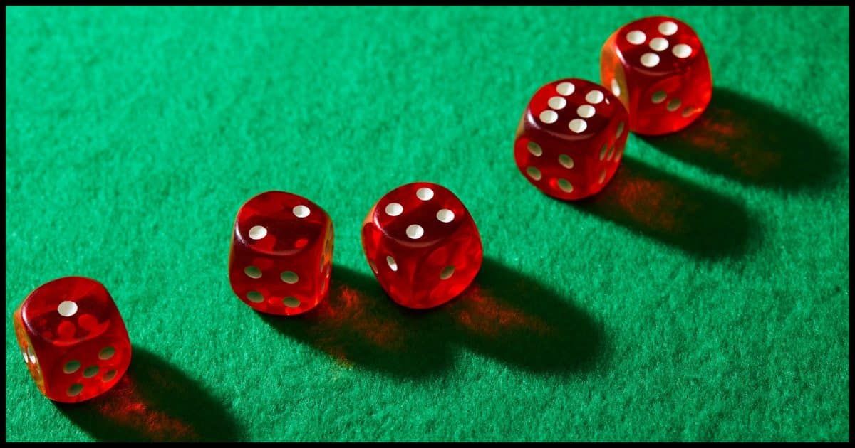 5 Dice on a green felt background.